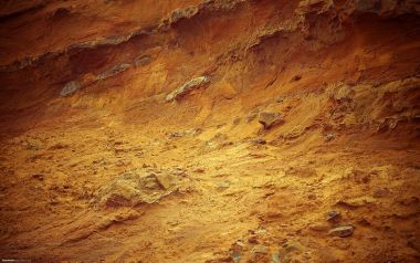 橙红色红砂岩风化岩层地质剖面风光