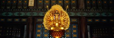 Gilded Thousand Hand Guanyin Statue In Ancient Chinese Temple