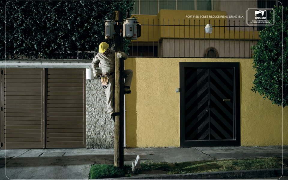 Mexican Electrician On Pole Advertisement