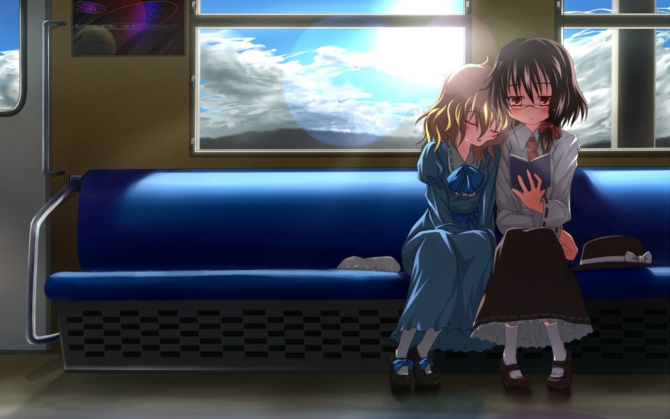 Two Girls On Train Reading And Companionship