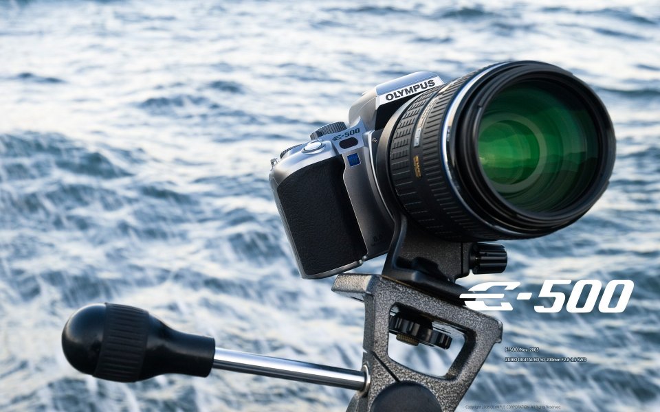 Olympus E 500 Camera On Sea Background