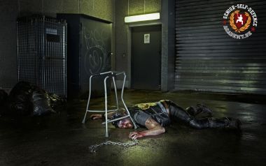German Biker Laying On Ground Alley