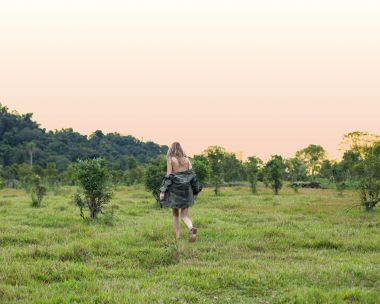 Flavia De Oliveira Sunset Grassland Backview