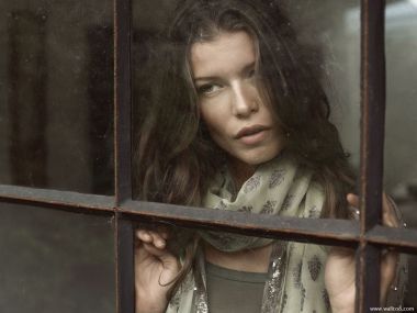 Woman Gazing Out Window Mood