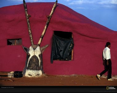 Ethiopian Red Dirt House With Bull Head Sculpture